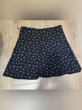 Black floral mini skirt